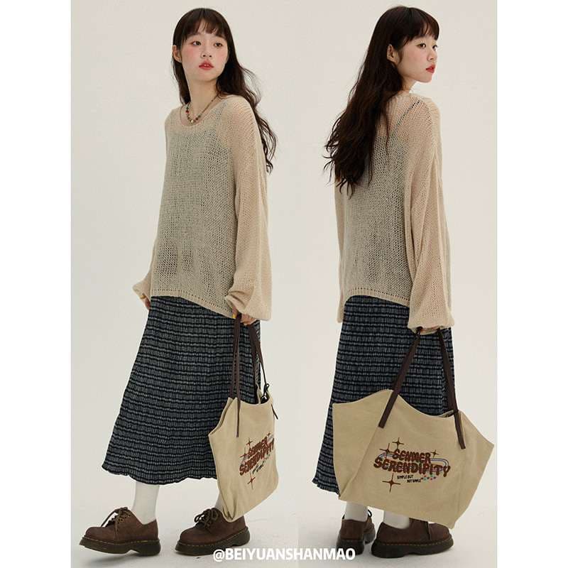 40代ファッション レディース ゆったりシルエットの透かし編みニット